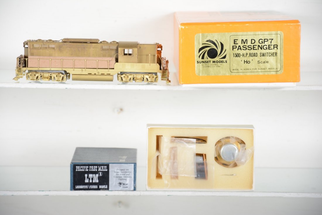 Sunset Brass HO GP7 Passenger Diesel with Sound: 1500 HP road switcher witch includes a PFM Sound unit. Like New to Mint, unrun, may have minor dust from display, near perfect paint, may have some tarnishing to finish. Original box, C10 Vintage bras
