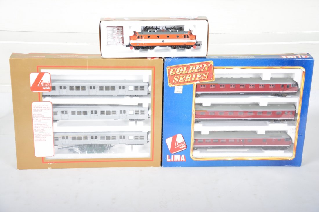 2 Lima HO Train Sets: Includes a 149808 3-car interurban set; 208053L Electric BO-BO with 149727 3pc commuter car set. All shows light runtime with C9 bodies with boxes.