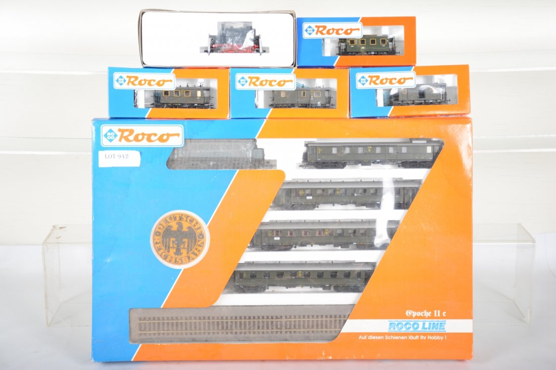2 ROCO HO Passenger Sets: Includes 43032 DB commuter set with an electric BO-BO with 4 cars and display track; Plus a 43257 0-4-0 steam tank loco with 4 passenger cars, all appear new in boxes, C10