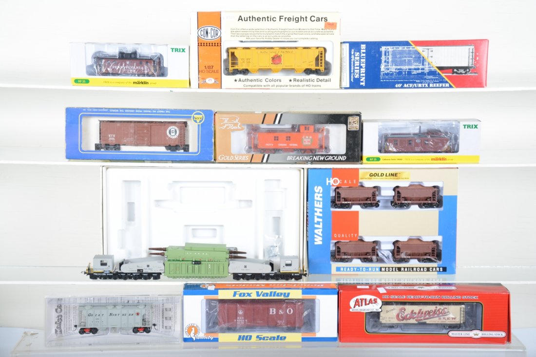 Assorted HO Freight Cars: Includes a Lilliput transformer car(assembled with box), C8; and several assorted American freight cars by Trix, AHM, Fox Valley, Walthers, Con-Cor and others, rest appear new in boxes, C10