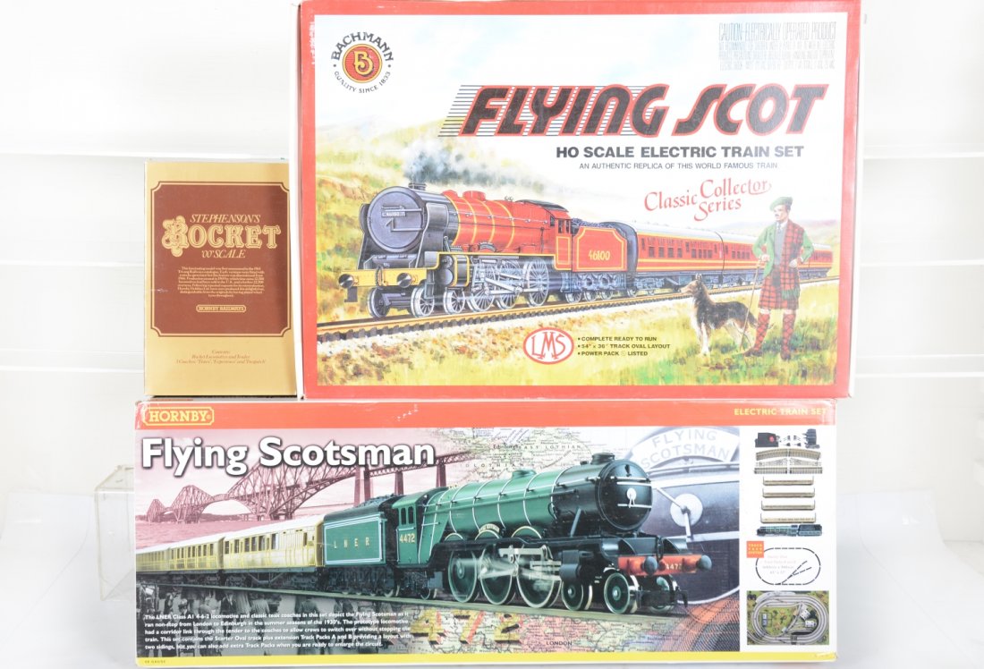 European HO Sets Lot: Includes a Bachmann Flying Scot 4-pc set with track & transformer; Bachmann Flying Scotsman 6pc set NO locomotive; Hornby Stephenson Rocket set, all appear unrun with set boxes, otherwise C9