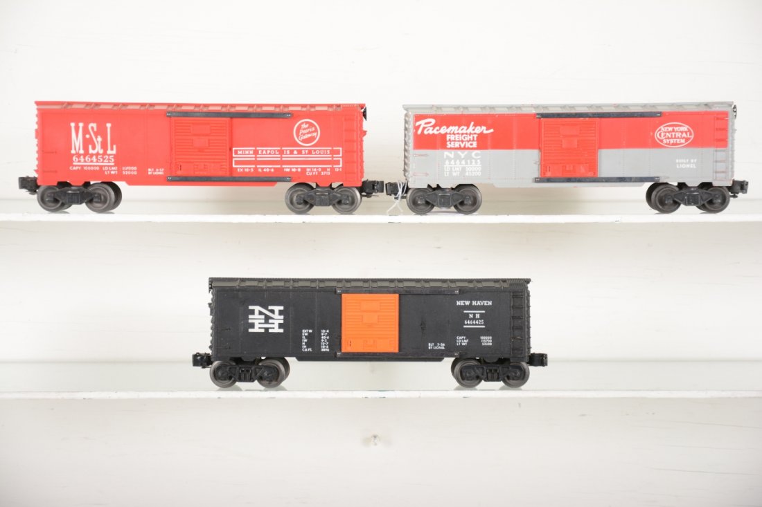 3 Clean Lionel 6464 Boxcars: Includes a 6464-125 NYC, type IIA with scarce tail on "S" both sides; 6464-525 M&StL, type IIB; 6464-425 NH, type IIB. They show light to moderate playwear, C7
