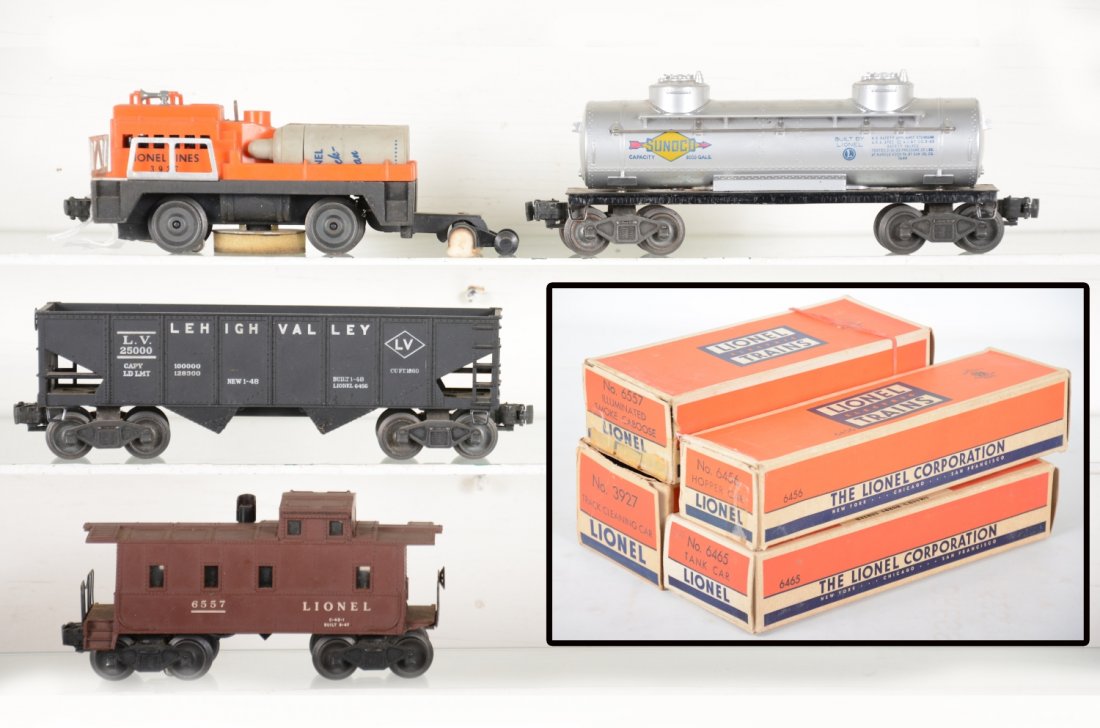 4 Boxed Lionel Cars: Includes a 3927 track cleaner, original bottles; 6557 smoke caboose, 1 broken step; 6456 LV hopper; 6465 Sunoco tank car. All show light to moderate playwear with boxes, rest C7