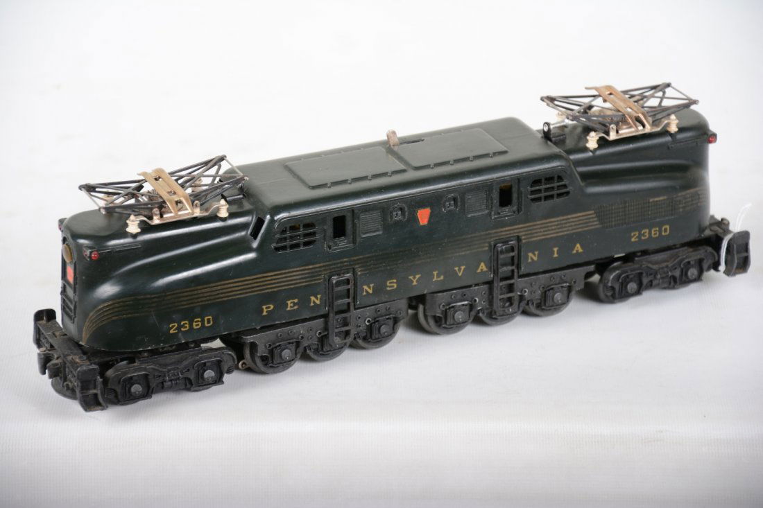 Clean Lionel 2360 PRR GG1 Electric: Nice dual motor GG1 with 75% stripes. It shows light playwear, otherwise C7