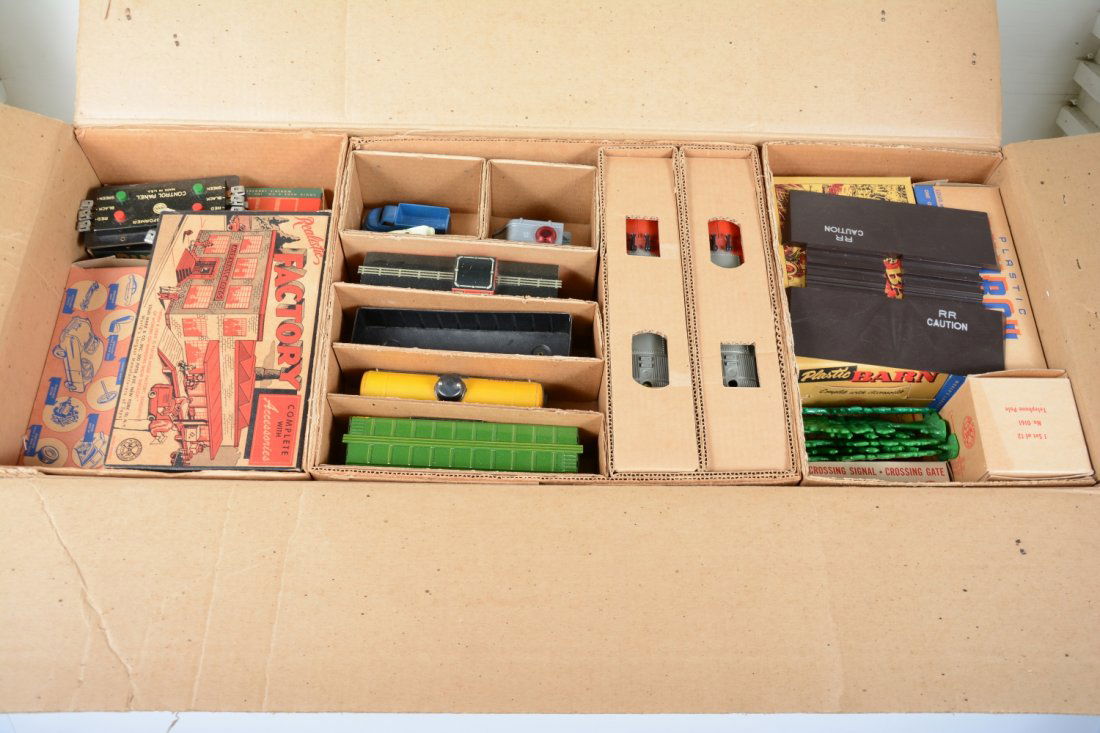 Rare Boxed Marx Montgomery Wards Set 44300: About as good as it gets! Includes a 1095 SF E7 AA diesel with D-truck tin Freight cars, all appear unrun. Also includes BOXED accessories- Barn, Church, Railroad station; Factory; Ranch House; Servic