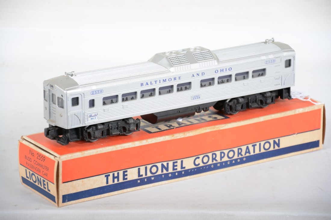 Nice Boxed Lionel 2559 Budd Trailer: Very clean with nice satin patina and strong lettering. It shows light runtime with nice box, C8