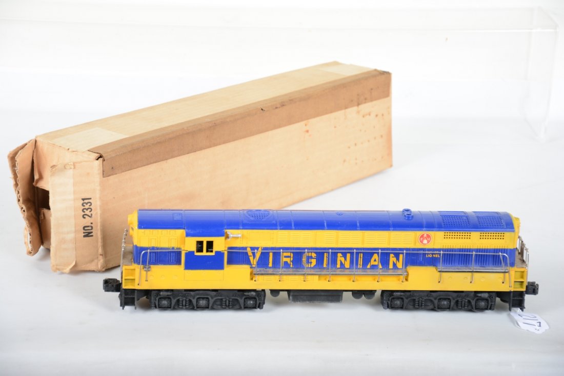 Boxed Lionel 2331 Virginian FM Diesel: Great pulling dual motor diesel. This is blue mold version with 1 hairline screw crack & 100% decals. Roof has been highly polished with a few scratches still apparent. It shows light runtime with nic