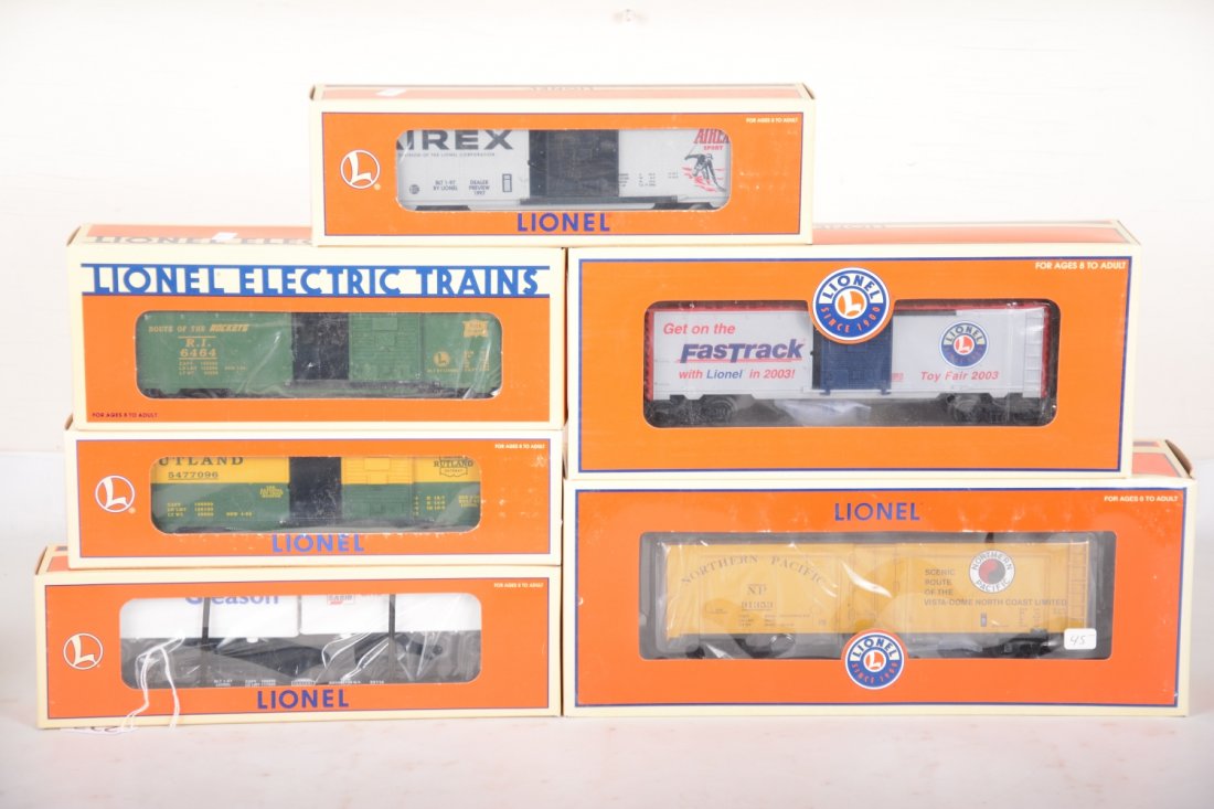 Lionel Freight Cars: Includes 16811 Rutland boxcar; 19258 RI boxcar; 29217 Airex boxcar; 52114 Gleason flat with trailers; 17379 NP reefer; 29918 2003 Toy Fair boxcar. All are unrun with boxes, C10