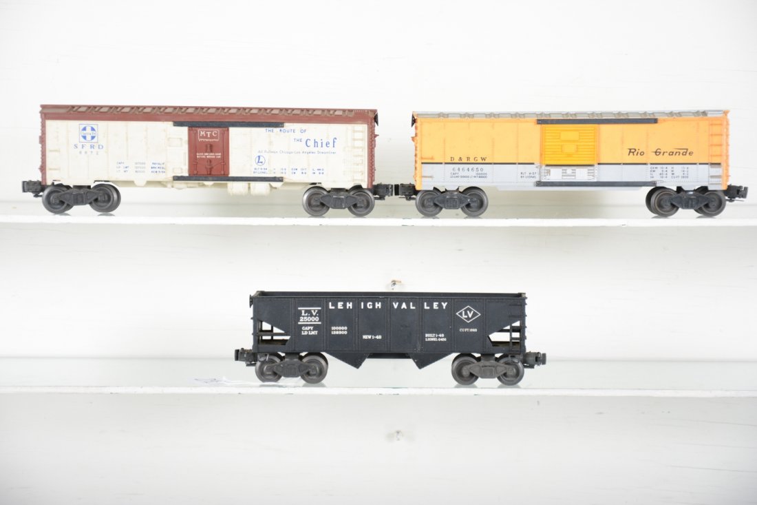 Lionel 6464-650, 6672 & 6456 Freight Cars: Includes a 6464-650 RG boxcar, type IIB; 6672 SF reefer; 6456 LV hopper. They could benefit from a cleaning, but only show light to moderate playwear, C7