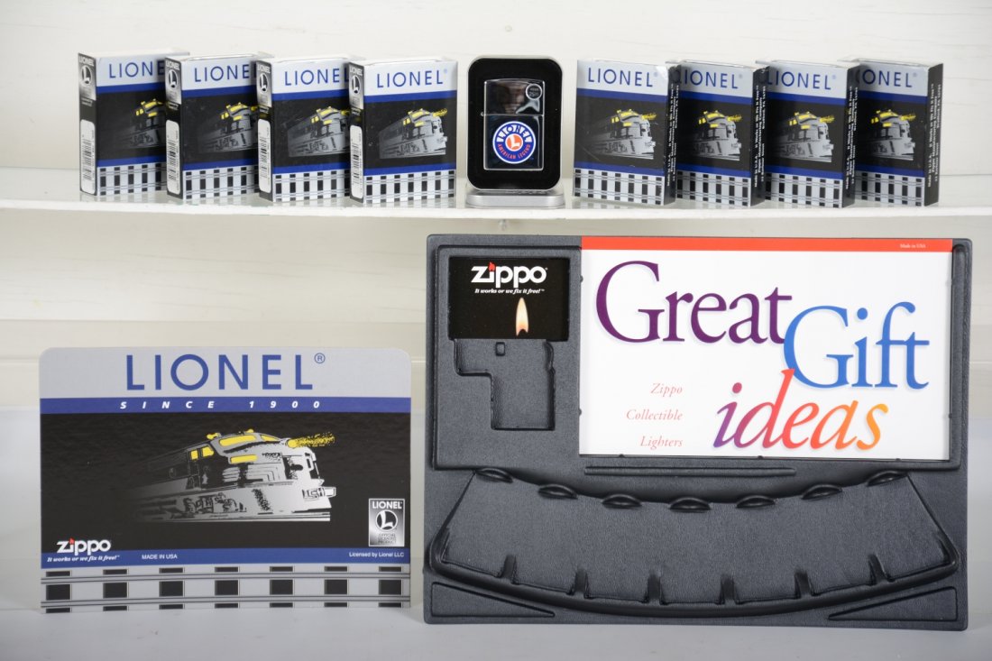 Unusual Zippo Lionel Lighter Store Display: Nice cross collectable! Includes 8 lighters and their store display. It is unused, new in box, C10
