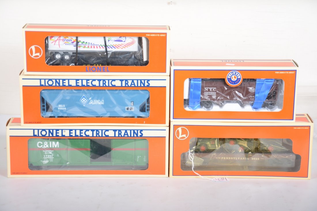 Lionel Standard O Freight Cars: Includes 17207 C&IM boxcar; 17021 NYC offset hopper; 19425 Artrain tractor flat; 17118 Archer 3-bay hopper; 17518 flat with Mac Trucks. All are new in boxes, C10