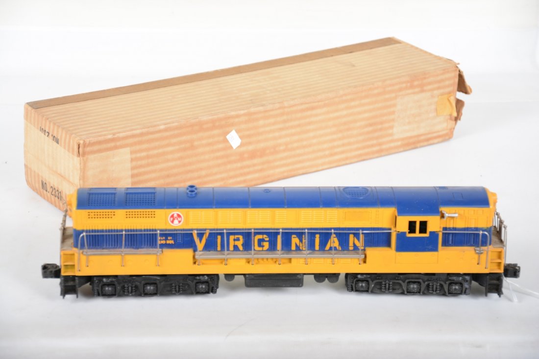 Boxed Lionel 2322 Virginian FM Diesel: Clean shell with No screw cracks. 1 front handrail shows light oxidation spots and there is light battery corrosion on frame, inside clean. Shell shows light playwear, C8 with nice box.