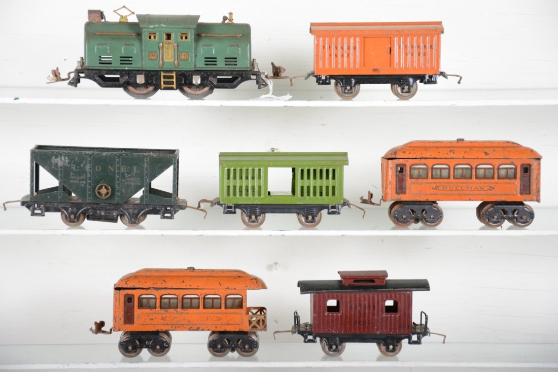 8Pc Lionel Early Freight/Passenger Set: Includes a 252 center cab electric, wheels fatigued C5; 602 Pullman; 603 Pullman, both C4; 803 hopper, C5; 800 boxcar; 803 stock car; 801 caboose, rest C6