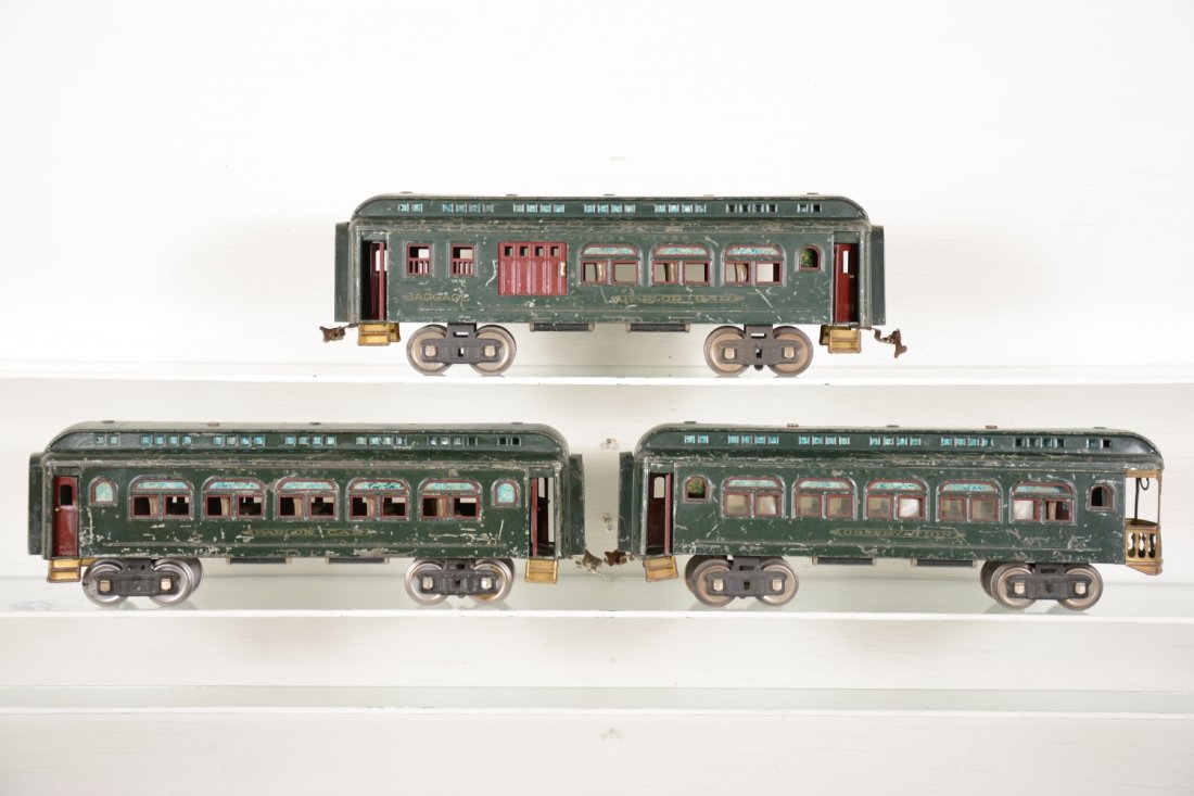 Lionel 420 Passenger Cars: ST Gauge. Includes a 429 combine; 428 Pullman, missing 1 coupler assembly; 430 observation. They have readable lettering and show moderate to heavy playwear, C4