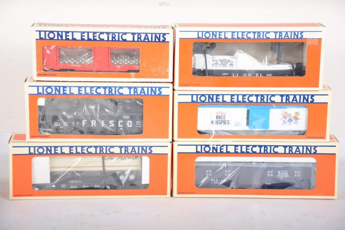 Lionel Freight Cars, Some Operating: Includes 19531 Rice Krispies reefer; 7530 mint car; 19411 NPR flat with Sears trailer; 19408 Frisco coil car; 19657 Wabash smoking bunk car; 16670 TV car. All are new in boxes, C10