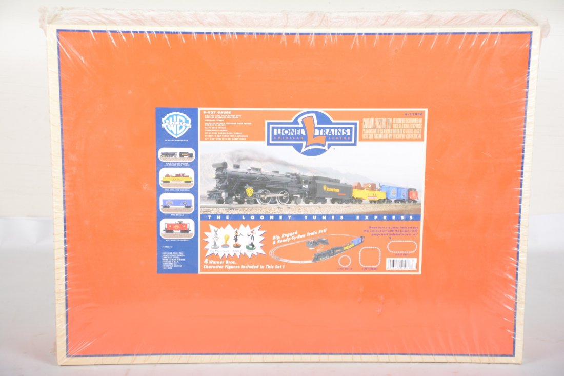 MINT Lionel 21936 Looney Tunes Express Set, Lot 1: Here is your chance to get them all in the next 3 lots! This lot includes the starter set which includes a 4-4-2 cast loco with light & smoke; whistling tender; animated gondola; boxcar; & caboose wit