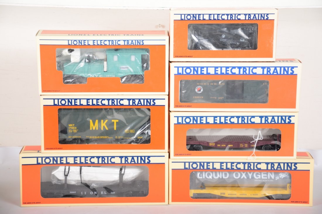 Lionel Rolling Stock: Includes 16368 Flat with Oxygen; 19714 NYC Smoking searchlight work caboose; 16661 flat with Bat op boat; 17004 MKT hopper; 16373 Erie Stakes, C10