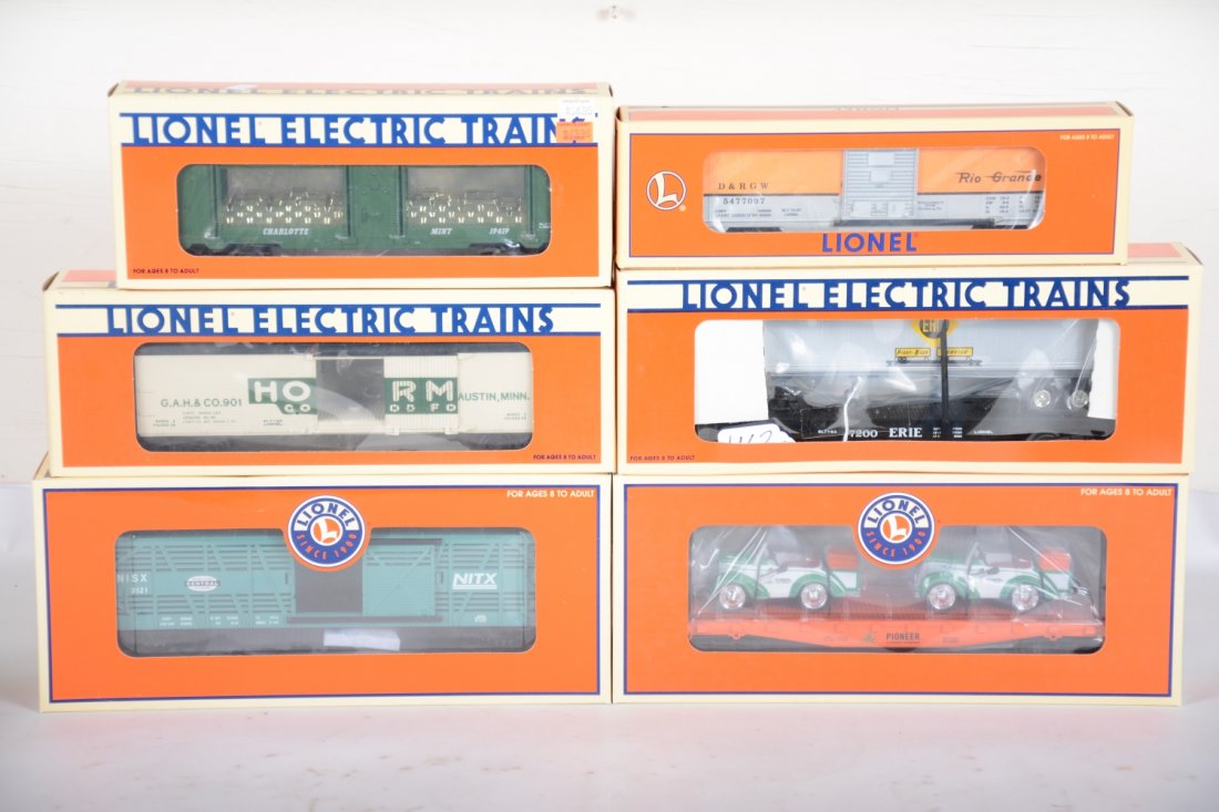 Lionel Freight Cars, Sounds Car Included: Includes 26795 NYC stock with Cattle Sounds; 19415 Erie trailer flat; 19419 Charlotte Mint car; 17572 Pioneer flat with pedal cars; 19532 Hormel reefer; 52118 RG boxcar. All are new in boxes, C10