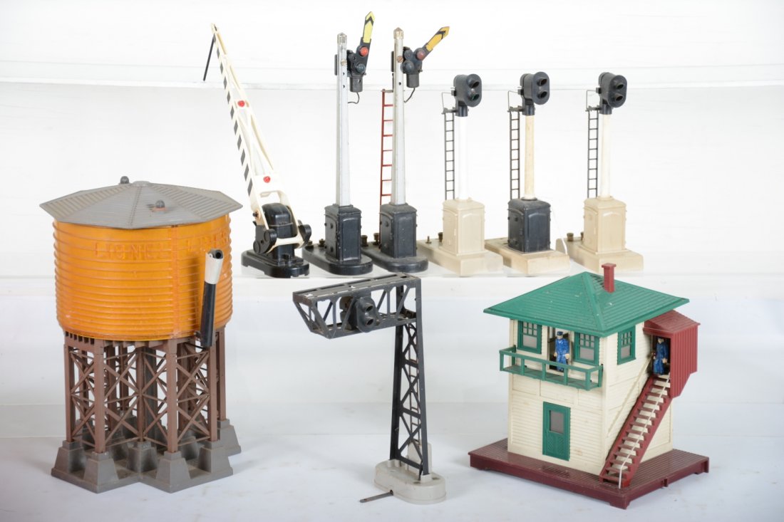 Lionel Accessories: Includes 30 water tank with instructions; 3 #253 block signals with 1 instruction sheet; 2 #151 semaphores; 252 crossing gate; 445 operating switch tower; 452 single gantry signal. All could benefit f