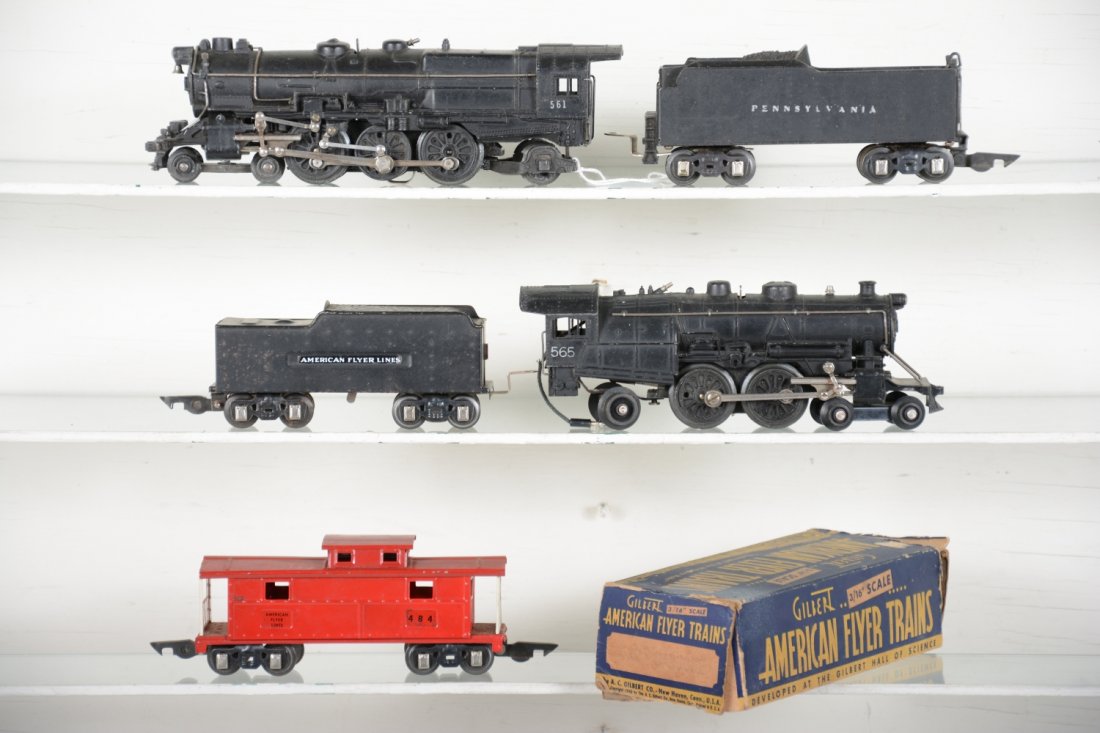 American Flyer 3/16 O Gauge Lot: Includes a 565 Atlantic loco; scarce 564C tender with Choo-Choo, replaced decals; 561 PRR K4 Pacific with 568 cast tender 484 caboose with box. They show light to moderate playwear, C7-7+