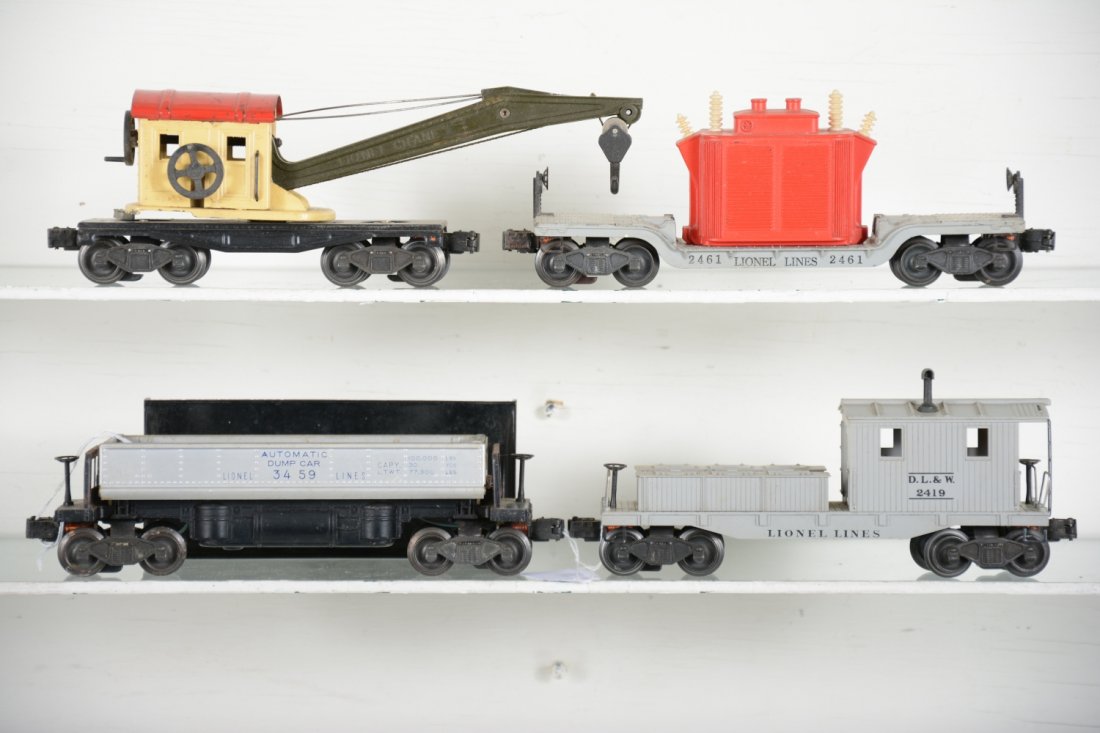 Early Lionel Freight Cars: Includes a scarce 3459 silver coal dump car with bin; 2461 flat with tougher red transformer, intact; 2560 crane; 2419 work caboose. All could benefit from a light cleaning, but only show light to mod