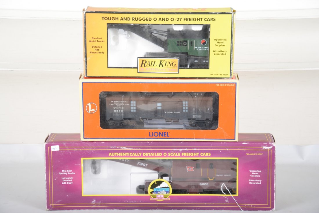 Lionel & MTH Freight Cars: Includes an MTH 20-98221 LV scale crane; 30-9711 crane; Lionel 19992 LRRC tool car. All show light runtime with C9 bodies and shop worn boxes.