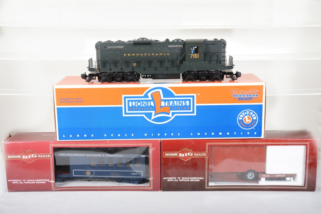 Lionel & Bachmann G Gauge Set: Includes a Lionel 85014 PRR GP9 Command Ready diesel; Bachmann 97143 B&O combine; PRR flat with trailer. All appear test run with boxes, C9-10