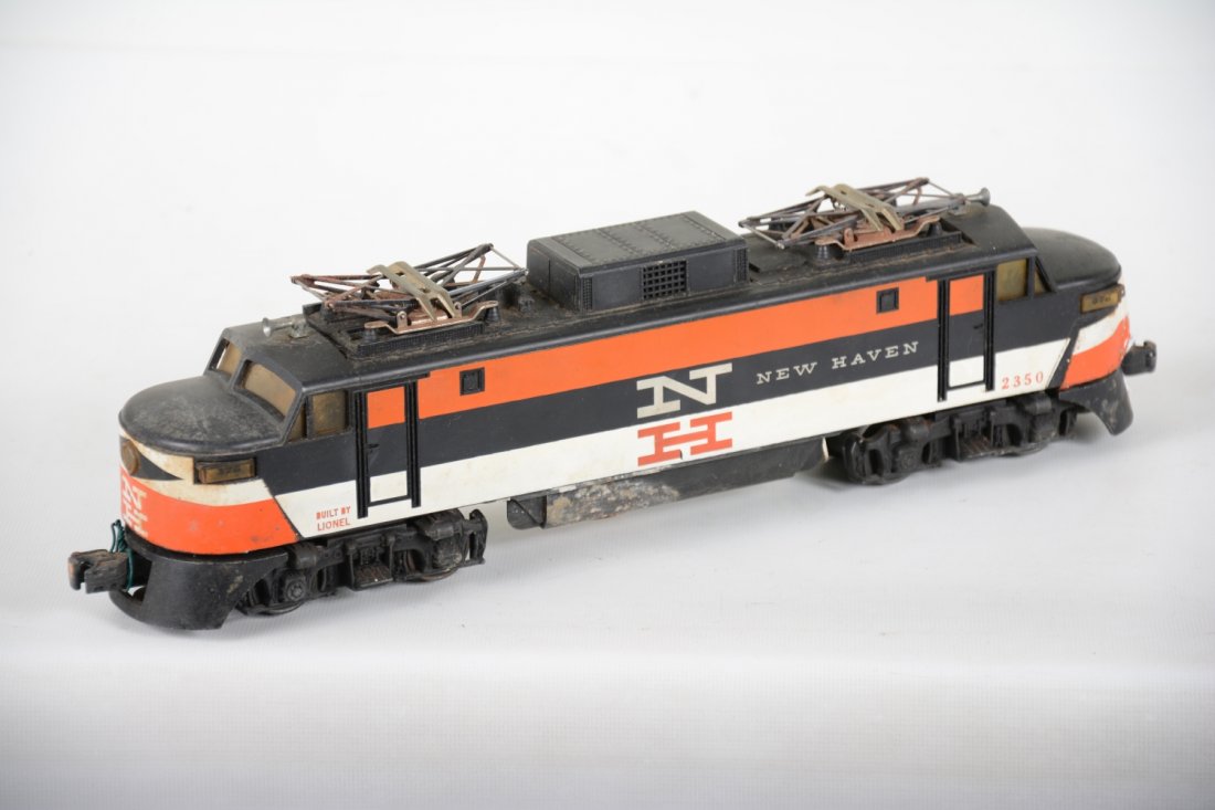 Lionel 2350 NH EP-5 Electric: Fairly clean body with original decals. Frame has some battery damage as photoed, cab shows moderate wear, C6