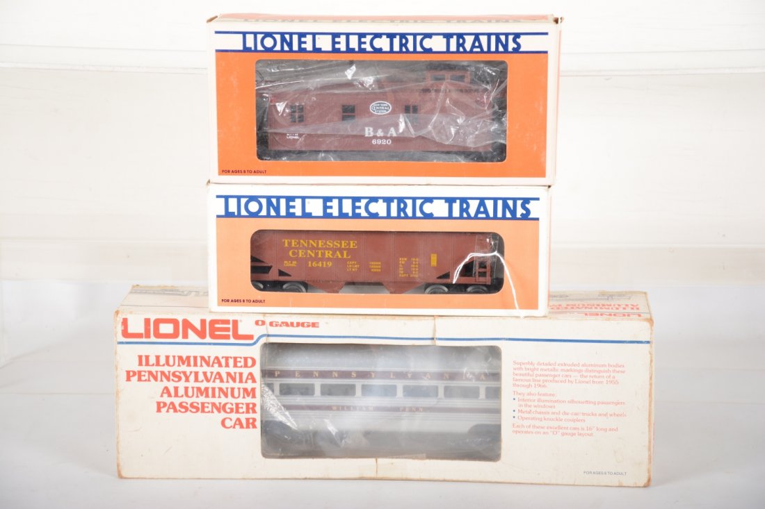 Lionel Modern Lot: Includes a William Penn coach; 6920 Standard O B&A caboose; 16419 Tennessee Central hopper. They appear new in boxes, C9-10