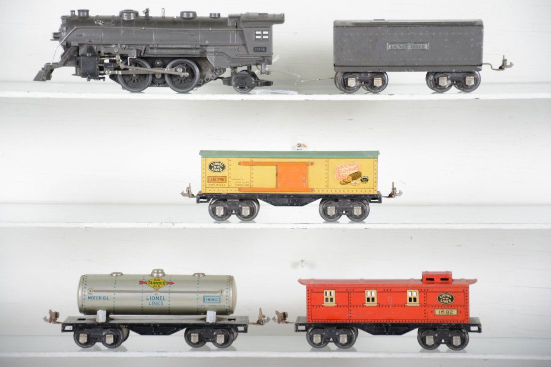 Lionel 1938 #1664 steam Freight Set: Includes a 1664 steam loco with matching gunmetal 1689T tender; 1679 boxcar; 1680 tank car; 1682 caboose, all fairly clean, showing light to moderate playwear, C6-6+
