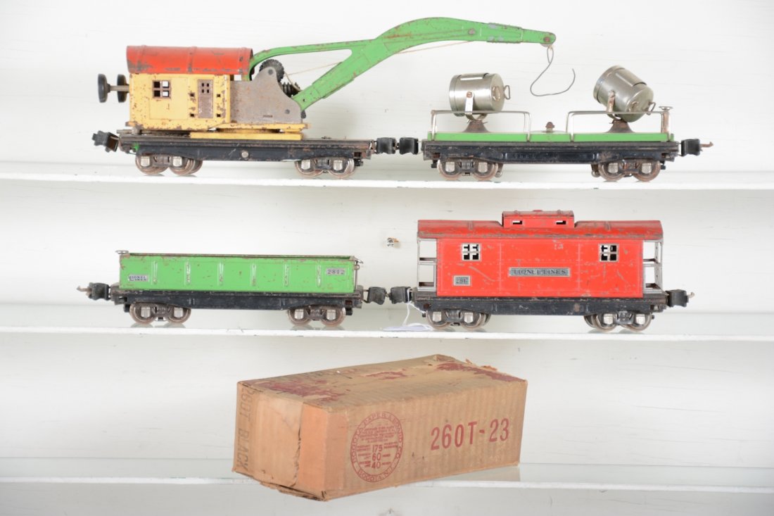 Lionel 2800 Series Cars, Plus: Includes work train cars 2812 gondola; 2820 searchlight; 2810 crane, missing hook, but gears function; 2817 caboose, all show moderate to heavy playwear, C4-5, Plus an empty 260T tender box.