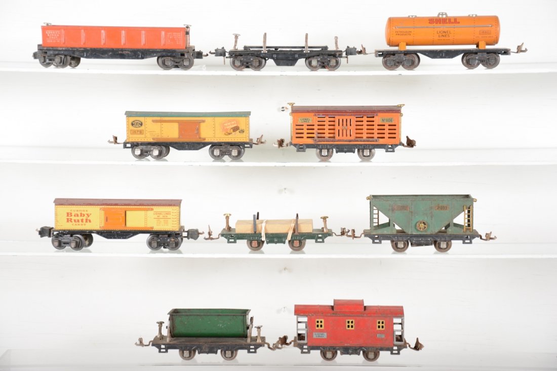 Lionel Pre War Rolling Stock: Includes 2812X gondola; 3651 lumber dump; 2 #1679 boxcars; 1680 Shell tank; 806 stock car; 831 lumber car; 803 hopper; 809 dump car; 806 caboose. All show moderate to heavy playwear, may clean-up a bi