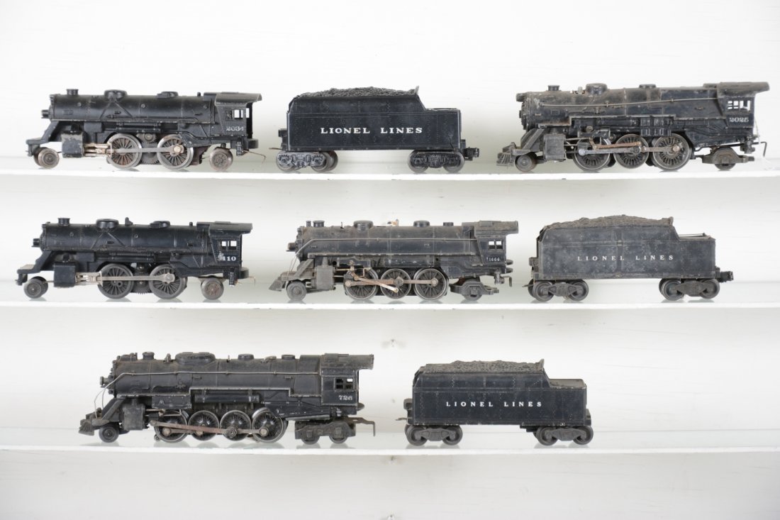 Lionel Loco & Tender Lot: Includes a 726 Berkshire, chip in bent roof corner, replaced boiler ring; 1666 loco; 2466W tender; 2025 loco, no running lights; 6466T tender; 1001 cast loco, C7; 2034 loco; 6066T tender. Rest show mo