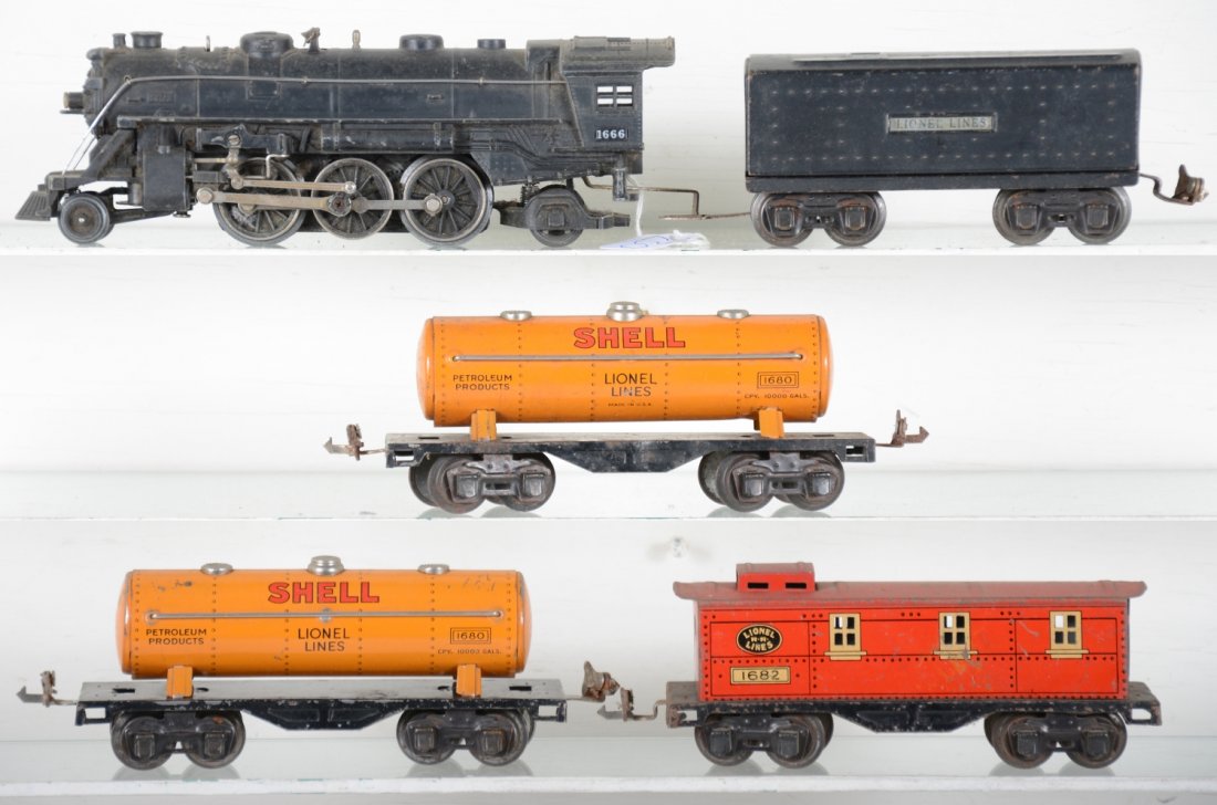 Lionel 1666 Steam Freight Set: Includes a 1666 steam loco; 1689T tender; 2 #1680 Shell tank cars; 1682 caboose, all show moderate playwear and will benefit from a cleaning, C6 ish