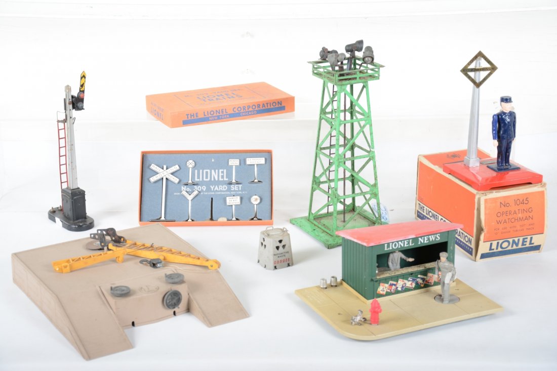 Lionel Accessories: Includes a 128 newsstand, repro hydrant; 462 derrick platform set, 1 container, small boom cracked, very dirty; 395 floodlight tower, C3; 151 semaphore, needs wiring; clean boxed 1045 flagman, C7+; 30