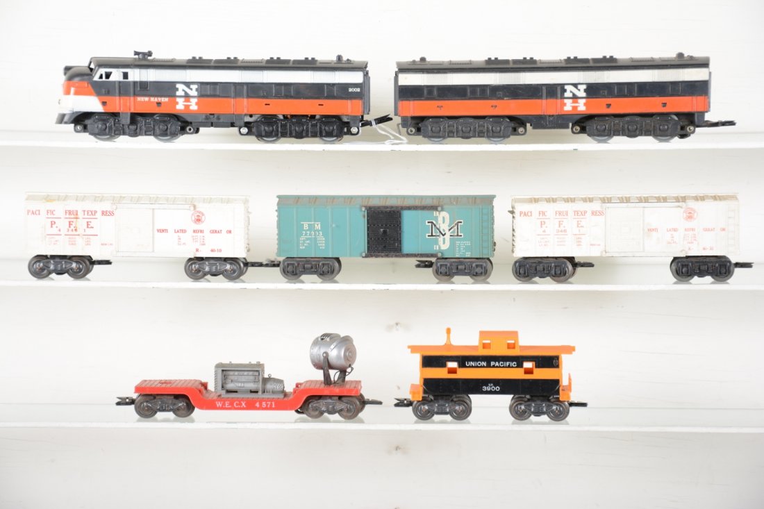Marx Diesel Freight Set: Includes a 2002 NH E7 AB diesels, B-unit missing 1 step; 3 boxcars; searchlight & UP caboose. All will benefit from a cleaning, but only show light to moderate playwear, C6-7