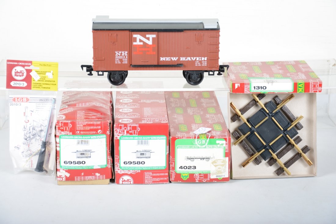 LGB G Gauge Lot, Plus: Includes an LGB 4023 flat car with 2 #69580 transformer loads; 1310 cross track; 2010D smoke unit; all boxed like new, C9-10, plus a Scientific Toys N H boxcar, C8