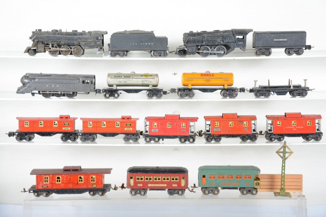 Lionel Pre War Trains Lot: Includes 1668E loco; 258 loco; 1689T tender; 603 Pullman; 608 observation; 3651 lumber car, missing 1 stake; 2 #657 cabooses; 2657 caboose; 1666E loco, missing trailing truck; repainted 2666W tender;