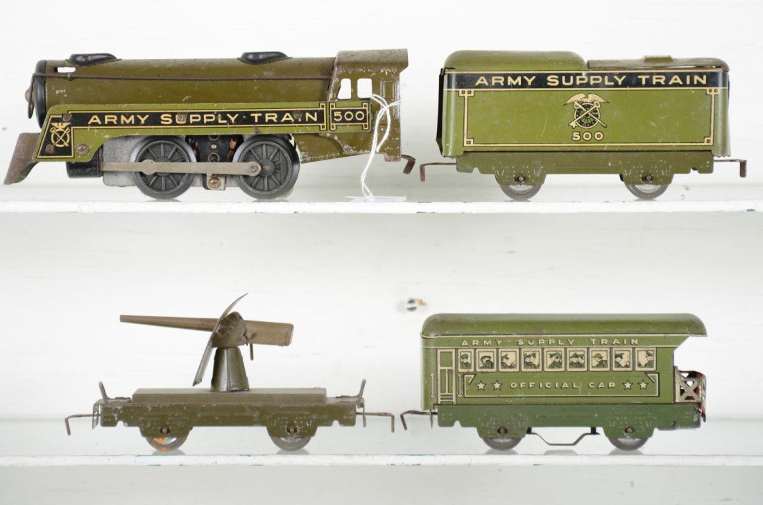 Marx Military Train Set: Includes a 500 USA loco & tender; flat with working machine gun; official observation with illuminated drum head. They show moderate playwear, C5-7