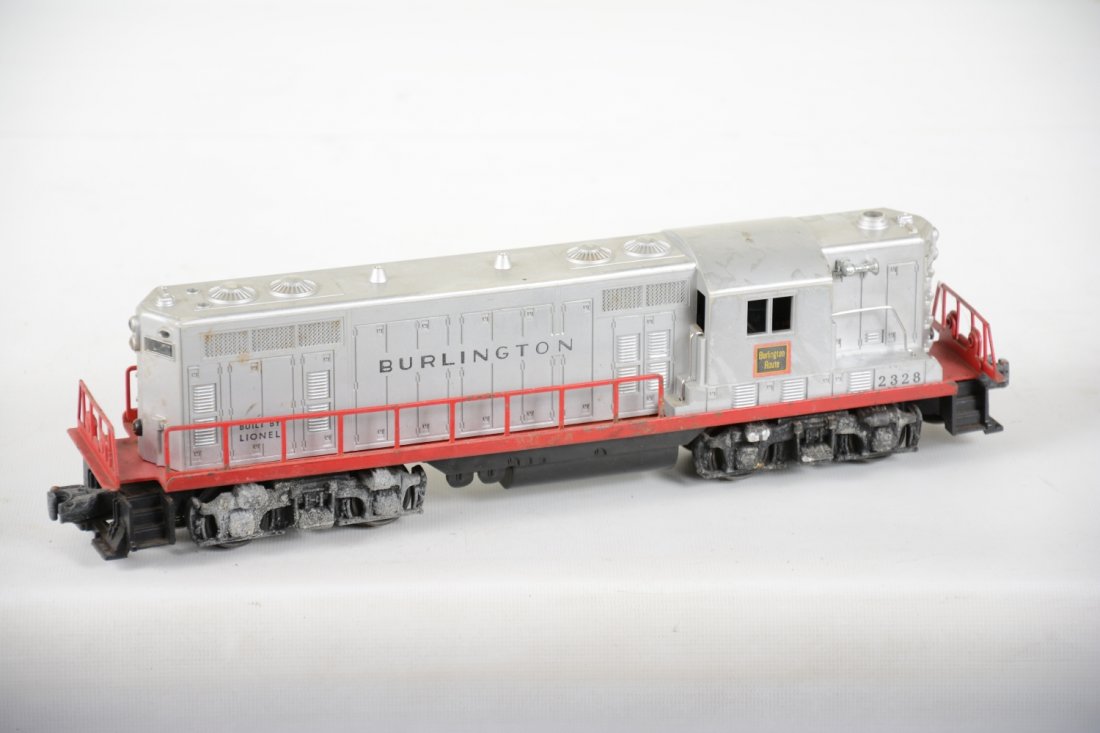 Lionel 2328 Burlington GP7 Diesel: Fairly clean shell with nice lettering. Some battery damage on frame with 1 side frame corroded, should otherwise clean to C5-5+
