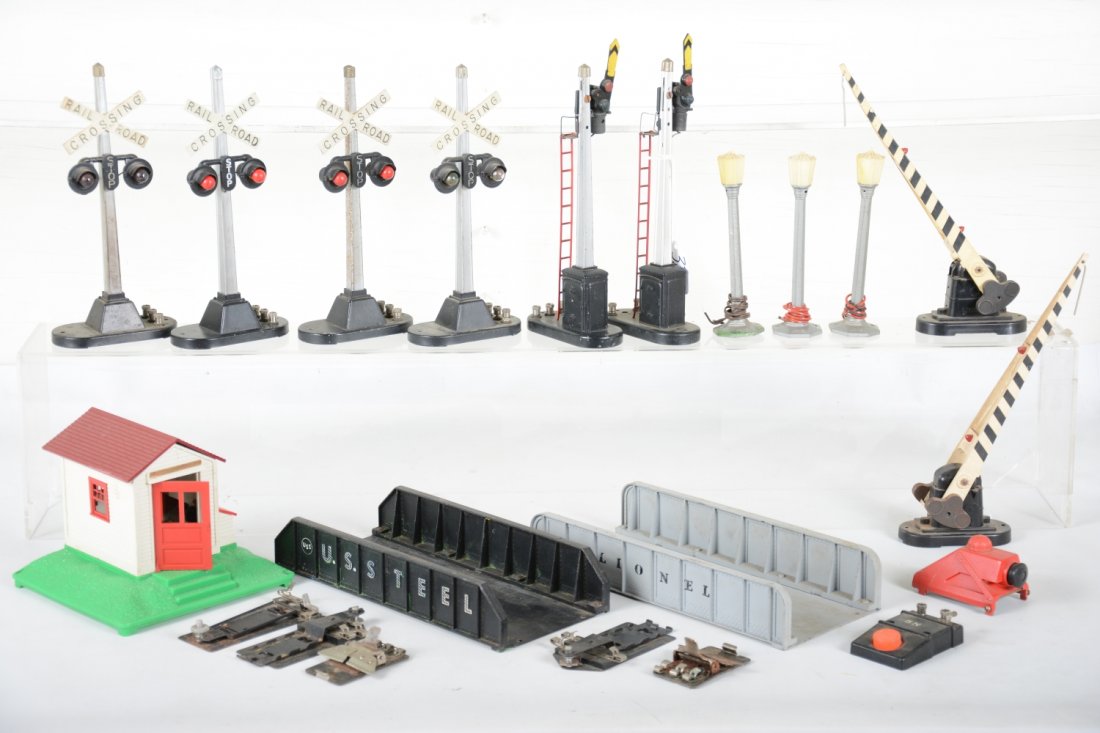 Lionel Accessories: Includes 125 whistling shack with 90c; 4 #154 flashers; 2 #151 semaphores; 2 #252 crossing gates, 1 repaired; 214 girder bridge; 260 bumper; 3 #71 lampposts; some contactors. All show light to moderat