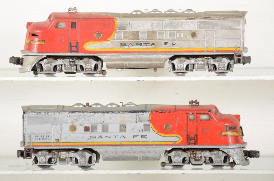 Lionel 2343 SF F3 AA Diesels: Maybe good restoration candidates as they only show moderate runtime with clean battery box, but paint is touch-up and heavily worn, C3