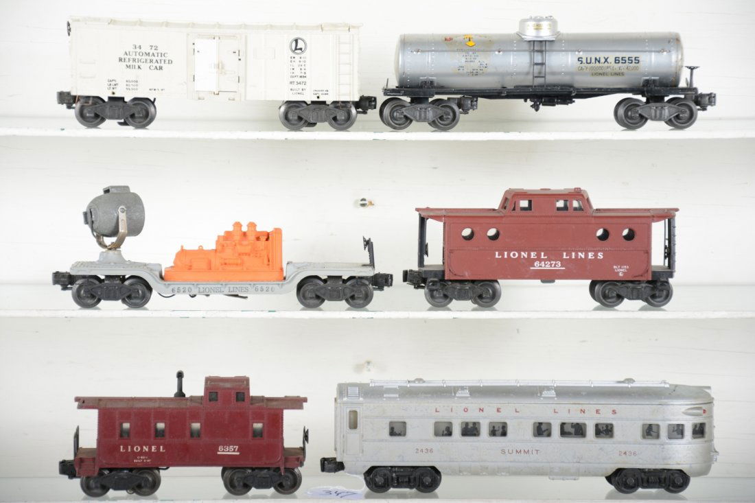 Lionel Rolling Stock: Includes 6427 N5c caboose; 2436 Summit observation, C5; 6520 searchlight, no lens; 6555 tank car, great silver, 50% decals; 3472 milk car only; 6357 caboose, rest show moderate playwear, C6-7
