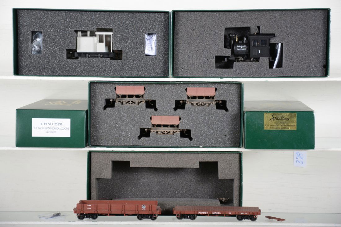 Bachmann HOn3 Trains Lot: Includes an unlettered Gas Mechanical switcher; 2 flat cars with box bottom only; C&S Porter 0-4-0 steam loco with 3-car side dump set. All show light signs of use with some boxes, C8+-9