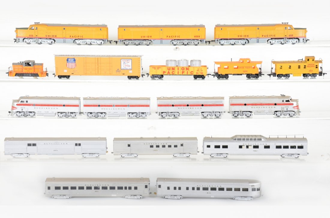 UP & CB&Q HO Train Sets: Includes an Athearn Burlington F7 ABBA with 2 powered units & 5 matching passenger cars; UP PA Alco ABA diesel set with 4 freights and a 44-ton diesel. All are fairly clean, showing light playwear.