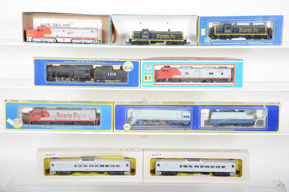 HO Santa Fe Locomotives: Includes 5196-B AHM RivaRossi Blue Goose Hudson; 5082-C 0-8-0 switcher & tender; Athearn PA1 Alco; Athearn & AHM RS-3 diesels; AHM U25C; Model power E7; ATT RDC-2 Powered & Dummy Budd car set. All sho