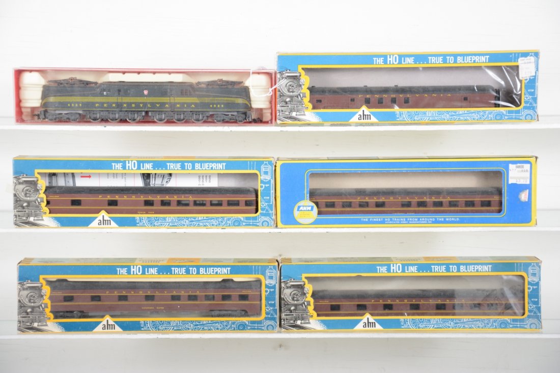 AHM RivaRossi PRR HO Passenger Set: Includes a GG1 electric, cab 4929 with 5 streamline passenger cars. All show light runtime with boxes, some cars missing box inserts, C8