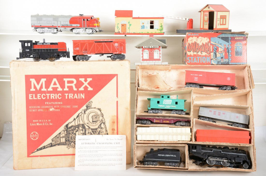 Marx Train & Accessory Lot: Includes partial set # 48-21325M with 1666 steam loco, PC tender 4 Freight cars, no autos for flat, setbox with inserts; 799 RI diesel; 1094 SF E7 dummy, 2 broken steps; GN operating stock car, gatema