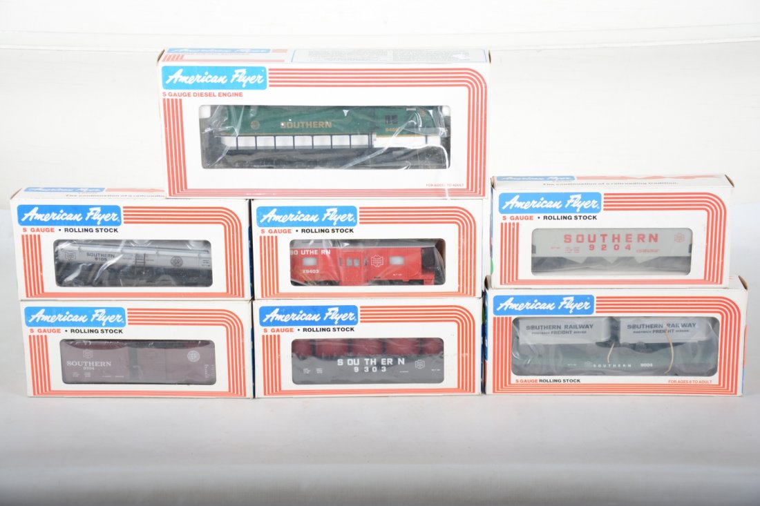 Lionel American Flyer Southern Diesel Freight Set: S Gauge. Includes an 8458 GP-9 diesel; 9303 gondola with canisters; 9004 flat with vans; 9704 boxcar; 9204 hopper; 9105 tank car; 9403 caboose. All are mint in b boxes, C10