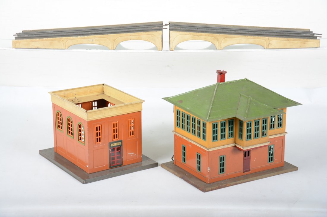 Lionel 437, 436, 69 & 100: Standard Gauge. Includes a 437 switch tower, complete with stained paper label underneath; 100 bridge ramps; 436 power station, missing skylight & stack; 69 white warning signal, base has some flaking